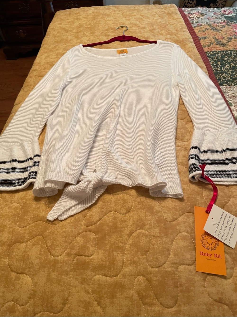 Ruby Rd. White Knit Tie-Front Bell Sleeve Top with black stripes.